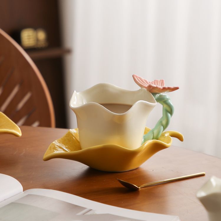 Flower and butterfly ceramic coffee cups and saucers
