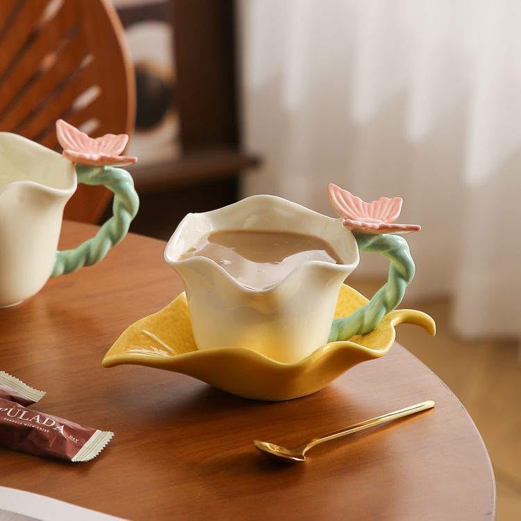 Flower and butterfly ceramic coffee cups and saucers