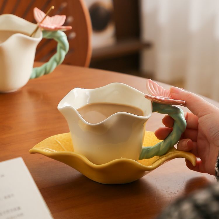 Flower and butterfly ceramic coffee cups and saucers