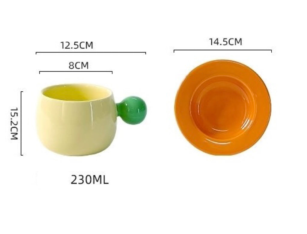 Coffee cups and saucers with contrasting colors and round handles