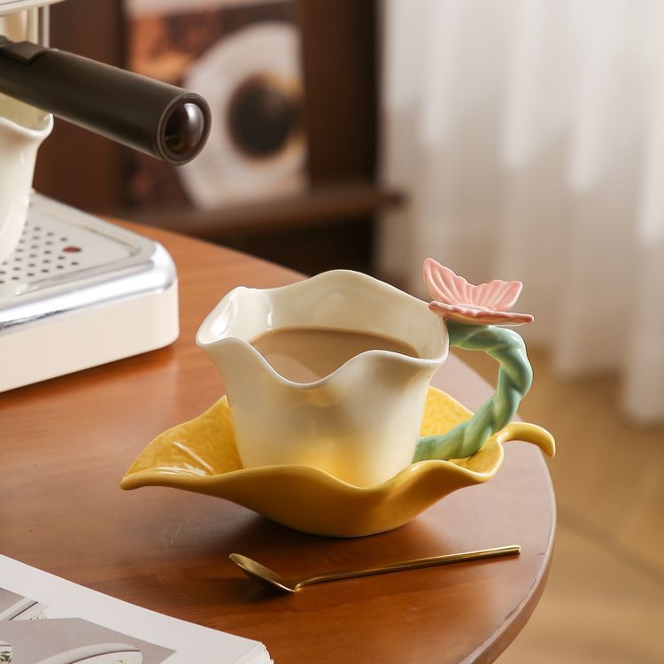 Flower and butterfly ceramic coffee cups and saucers